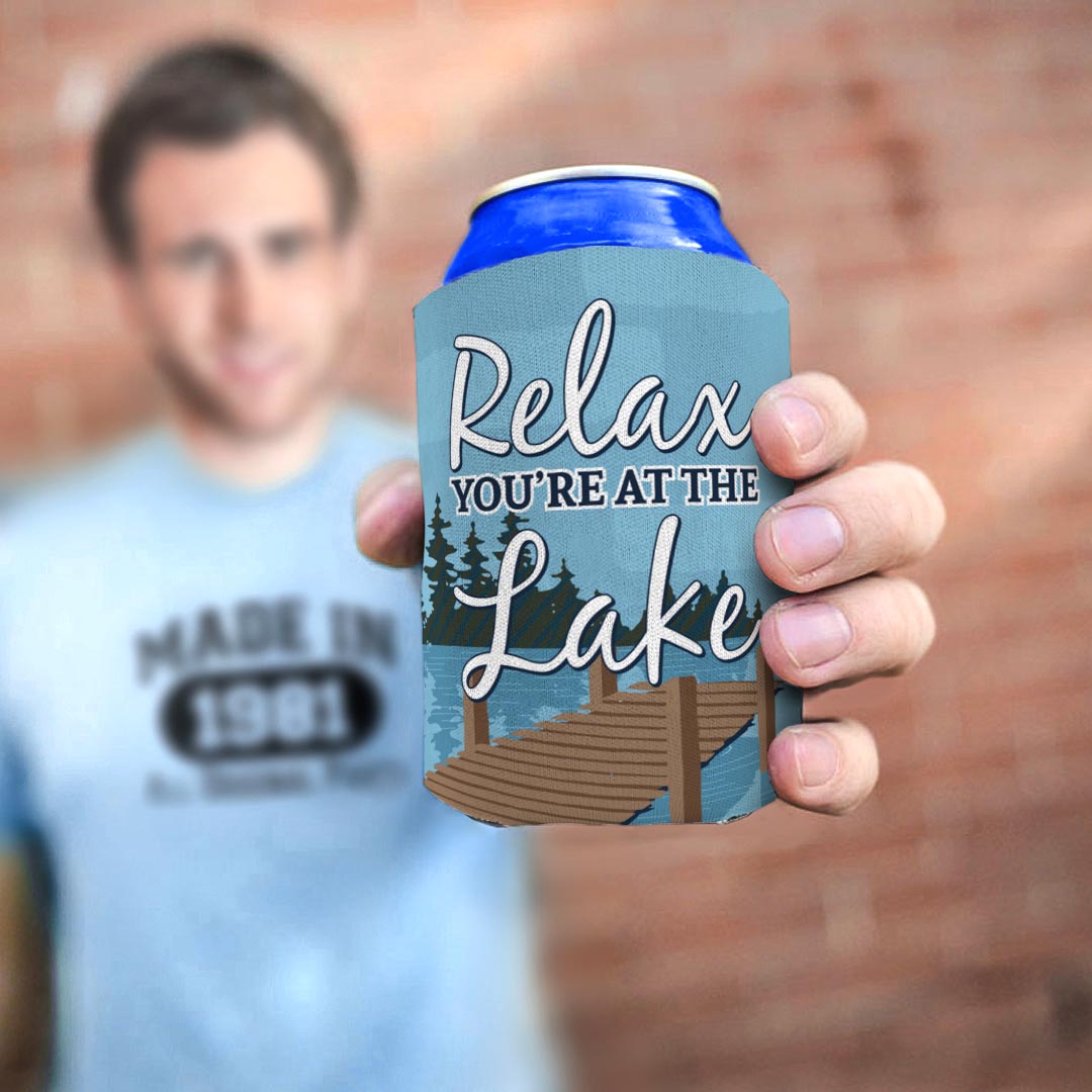 man holding drink sleeve