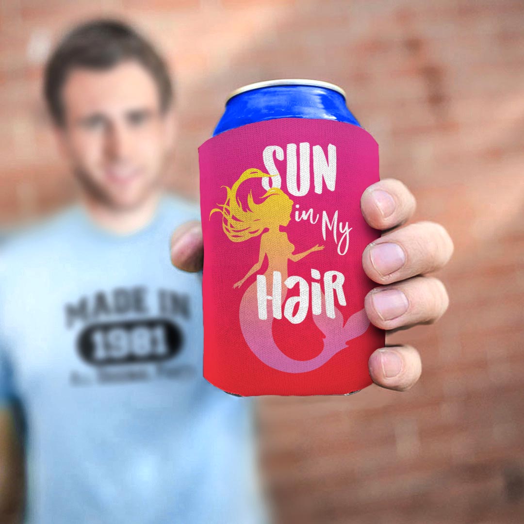 man holding drink sleeve