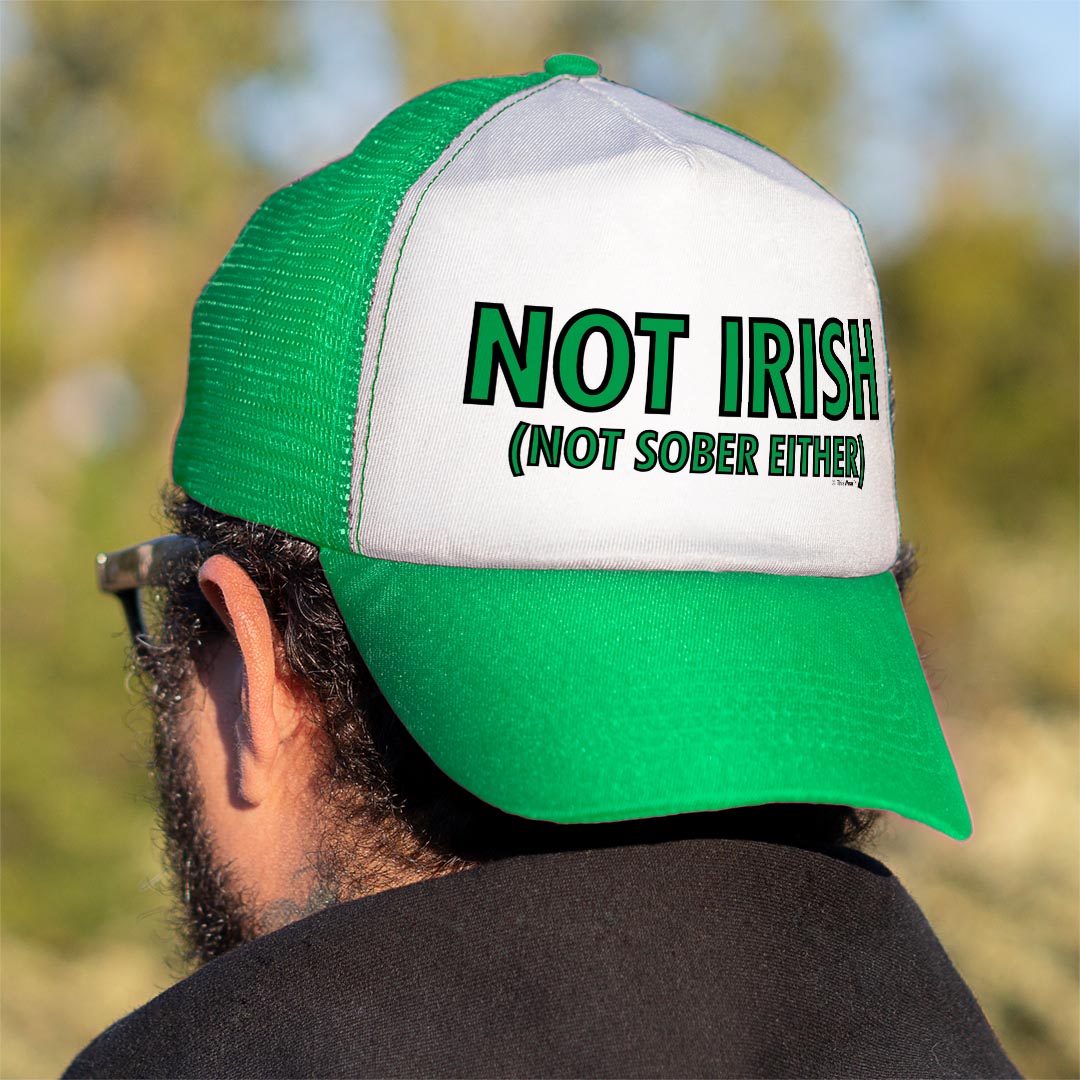 man wearing trucker hat backwards